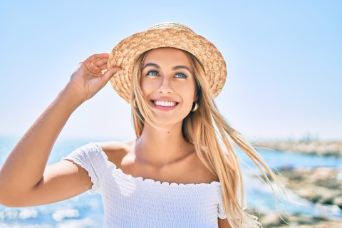 close up picture of a woman smiling showing beautiful white teeth